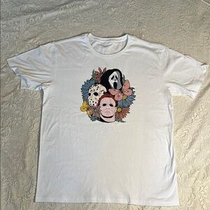 White Graphic T-Shirt with Horror Characters and floral design.